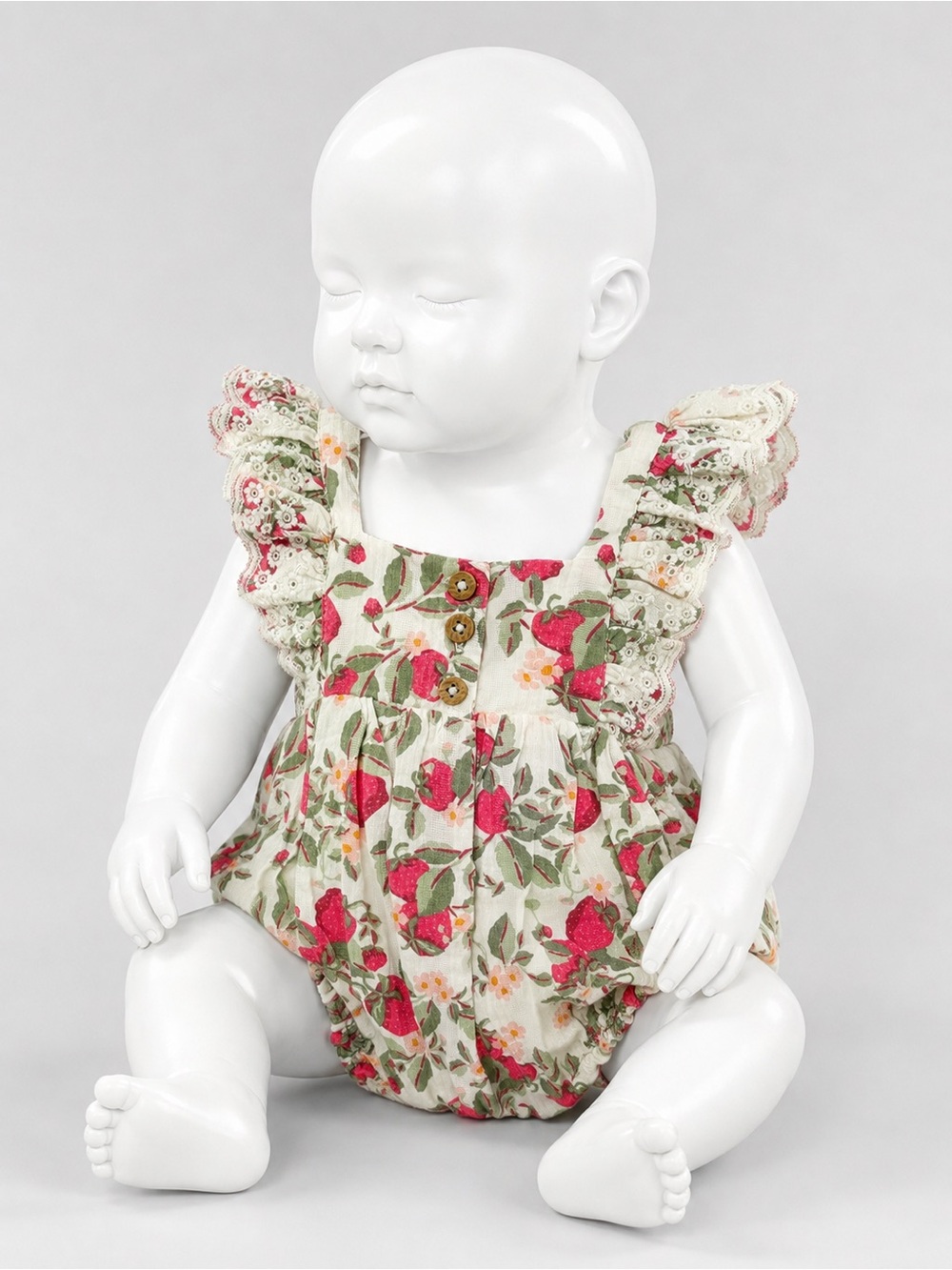 cupcakes & cashmere Cream Floral Ruffle Baby Romper with Pink Accents 3Months